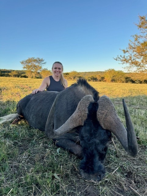 Brooke McGee, Fort Worth Sables vice president, outdoors with a buffalo
